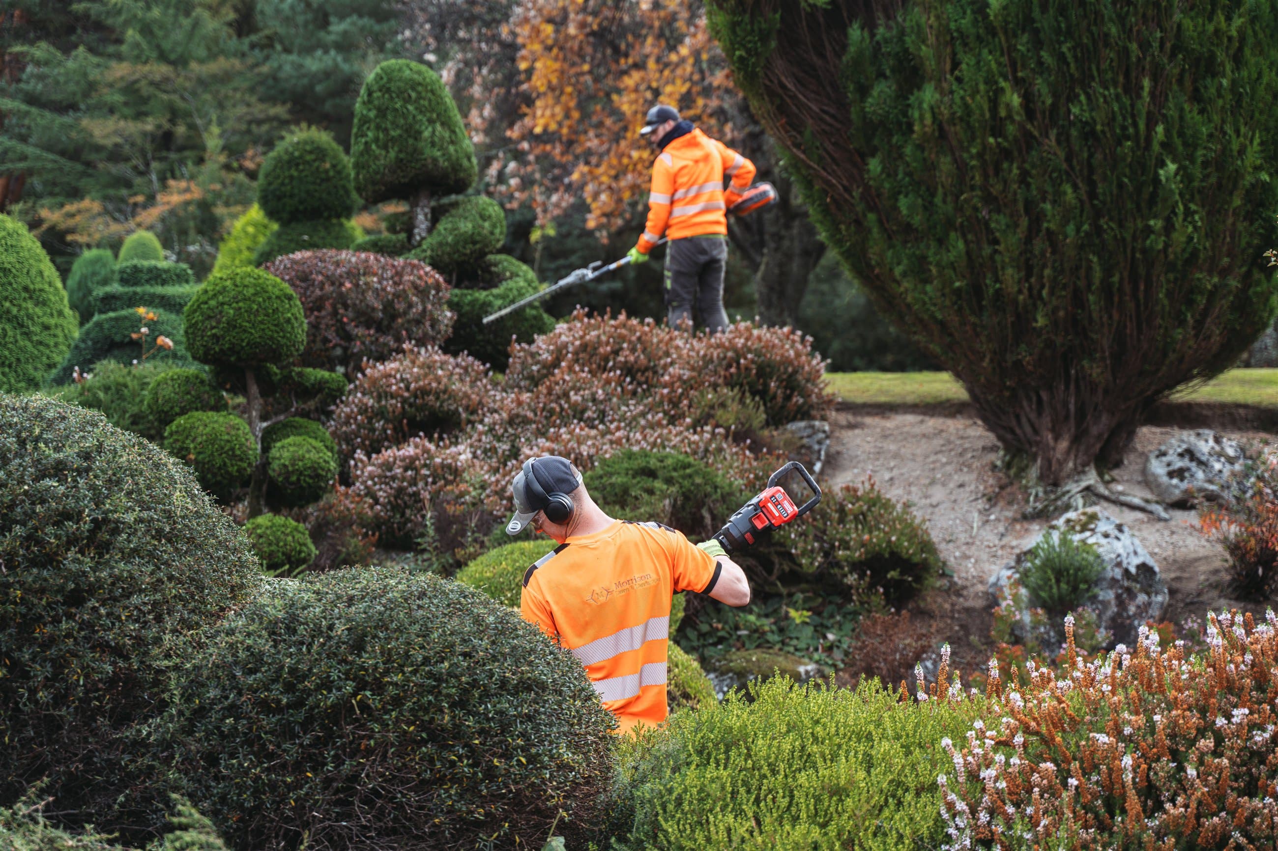 A landscaping team at work in a distinctive Highland garden