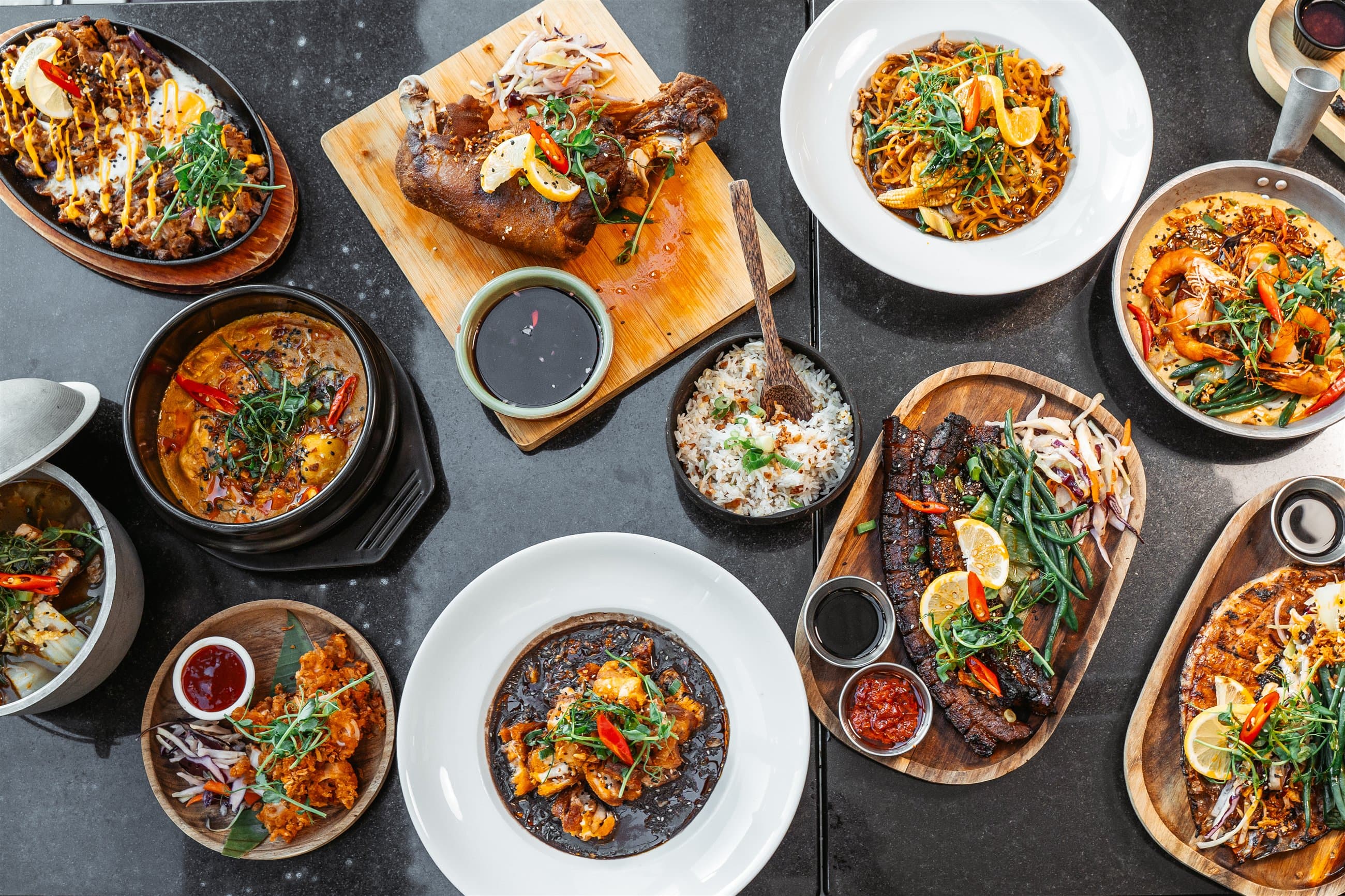 A full restaurant menu photographed from above for a client campaign